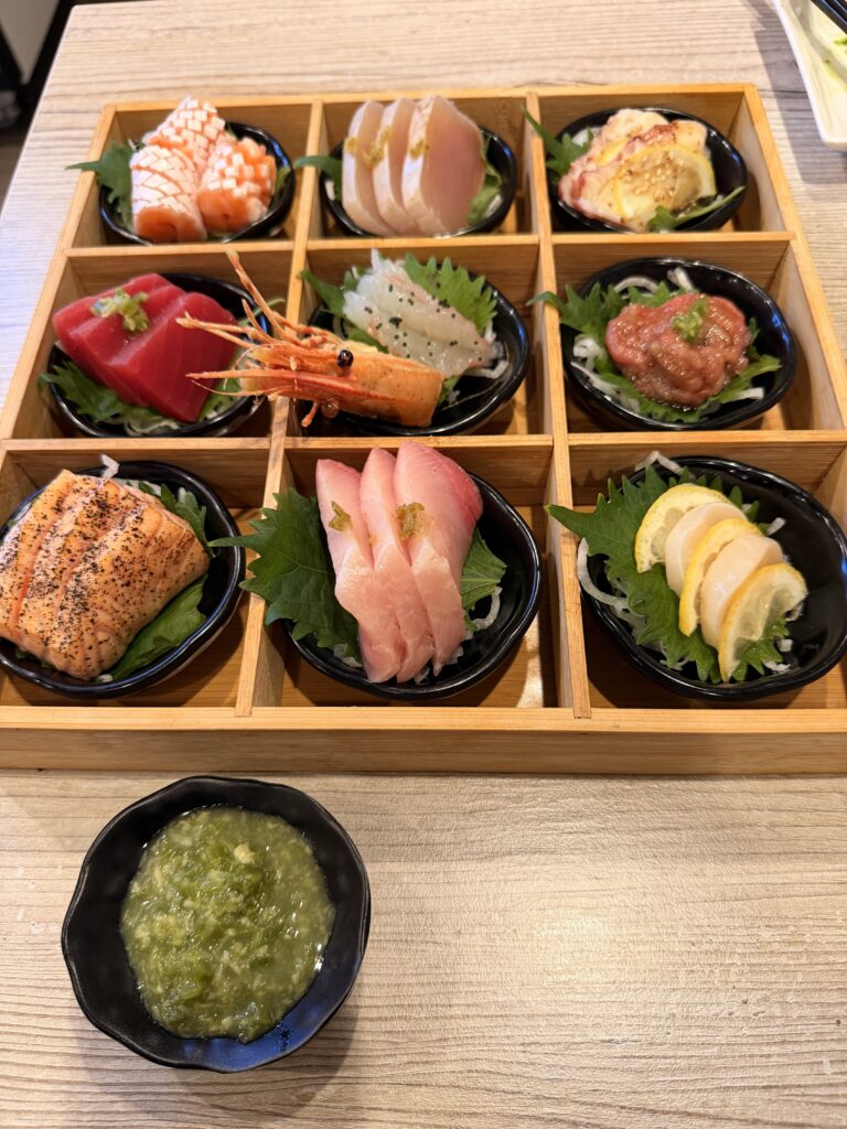 Deluxe Nine-Grid Omakase Sashimi platter at Bengee Sushi with toro subbed for uni